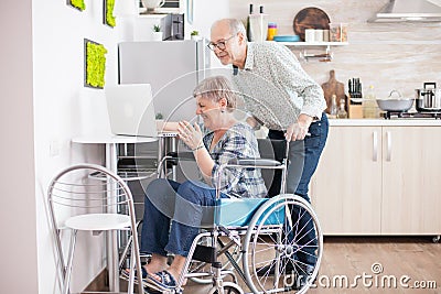 Excited senior couple laughing Stock Photo