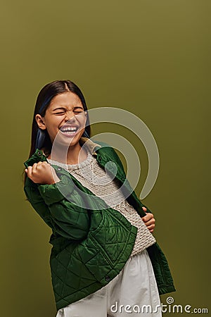 Excited and stylish preadolescent girl with Stock Photo