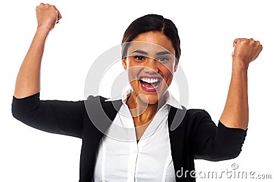 Excited woman with clenched fists Stock Photo