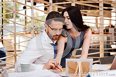 Excited woman seducing her boss Stock Photo
