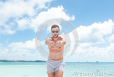 Excited Young Man In Bathing Suit Pointing Royalty Free Stock Images ...