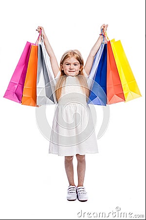 Excited Young Shopper with Big Colourful Shopping Bags. Stock Photo