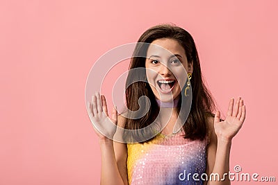 Young stylish disco girl with open mouth isolated on pink Stock Photo