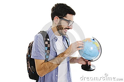 Excited young traveler with globe Stock Photo