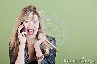 Excited Young Woman on Phone Stock Photo