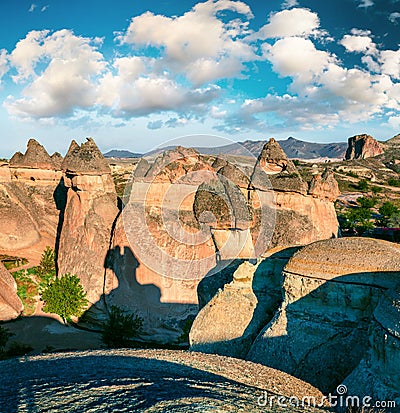 Exciting fungous forms of sandstone in the canyon near Cavusin village, Cappadocia, Nevsehir Province in the Central Anatolia Stock Photo