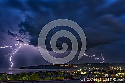 Exciting powerful lightning over the sea Stock Photo