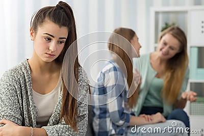 Excluded teenage girl sitting Stock Photo