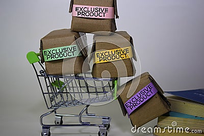 Exclusive Product Text in small boxes and shopping cart. Concepts about online shopping. Isolated on white background Stock Photo