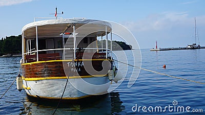 Excursion boat anchored in marina Editorial Stock Photo