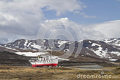 Excursion ship Bitihorn in hibernation Stock Photo