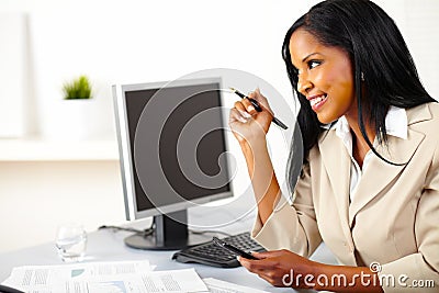 Executive female using a cellphone Stock Photo