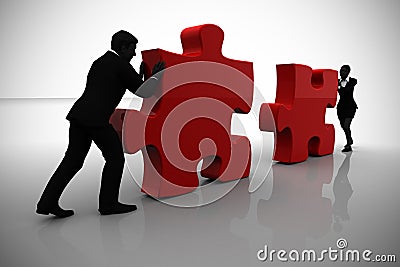 Executives connecting jigsaw puzzle pieces Stock Photo