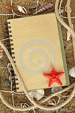 Exercise book and sea stars Stock Photo