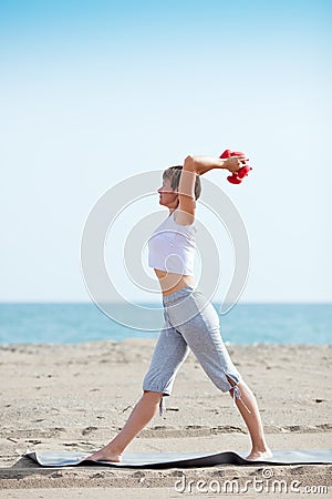 Exercise with dumbell Stock Photo