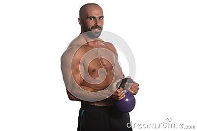 Exercise With Kettle Bell Over White Background Stock Photo