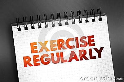Exercise Regularly text quote on notepad, concept background Stock Photo
