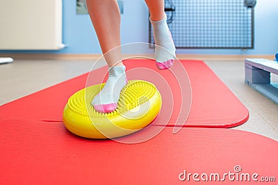 Exercises for ankle proprioception in a physiotherapy study Stock Photo