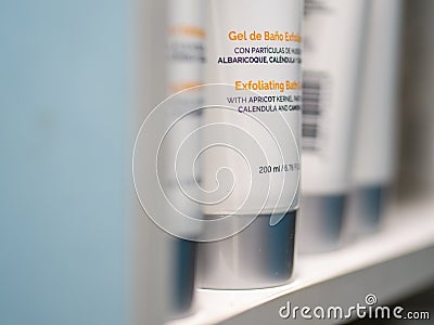 Close up of exfoliating lotion bottle on a shelve Stock Photo