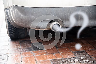 Exhaust from a car with diesel engine emitting gas in the shape Stock Photo
