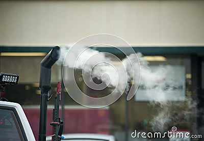 Exhaust fumes coming out of motor vehicle Stock Photo