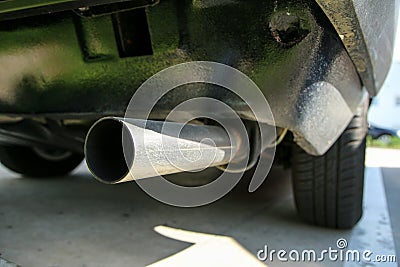 the exhaust tailpipe of the old classic veteran car Stock Photo