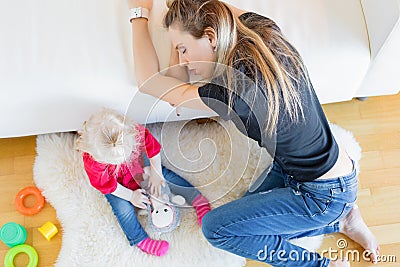 Exhausted Mom Sleeping Stock Photo | CartoonDealer.com #115288200