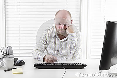 Tired and Exhausted Office Worker Stock Photo