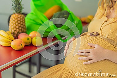 Exhausted but resilient, a pregnant woman feels fatigue after bringing home a sizable bag of groceries, showcasing her Stock Photo