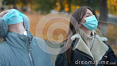 Exhausted Schoolgirls in Coronavirus Face Masks Standing Outdoors ...