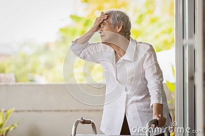 Exhausted senior woman has headache dizziness from the sizzling summer temperatures,old elderly suffering from hot summer weather, Stock Photo