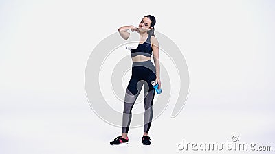 exhausted sportswoman with towel and sports Stock Photo