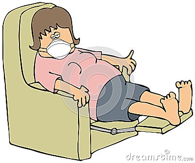 Exhausted woman in a recliner wearing a face mask Stock Photo