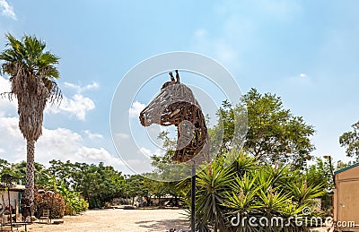 An exhibit in the form of a horses head made from the remains of iron, produced by craftsmen living in Kibbutz En Carmel, in Editorial Stock Photo