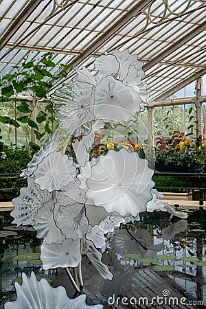 Exhibit by glass artist Dale Chihuly in Waterlily House at Kew Gardens, Richmond, London, UK. Editorial Stock Photo