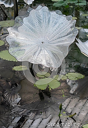 Exhibit by glass artist Dale Chihuly in Waterlily House at Kew Gardens, Richmond, London, UK. Editorial Stock Photo
