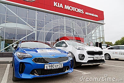 Exhibition car stands in front of the building of KIA MOTORS car selling and service center Editorial Stock Photo