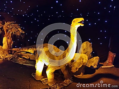 An exhibition of dinosaur sculptures designed similar to the original Editorial Stock Photo