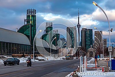 Exhibition district in modern metropolis city of Toronto, with epic view of famous CN tower in background Editorial Stock Photo