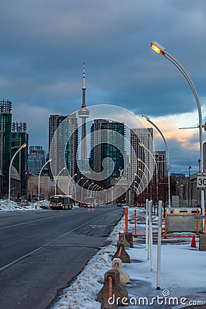 Exhibition district in modern metropolis city of Toronto, with epic view of famous CN tower in background Editorial Stock Photo