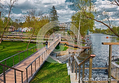 Exhibition of Economic Achievements, view of wooden walkways on the shore of the river Kamenka: Moscow, Russia - May 07, 2021 Editorial Stock Photo