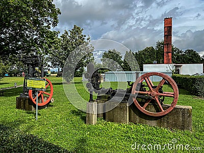 An exhibition of old steam engines on the square next to the historic stebra mine in Tarnowskie GÃ³ry. piston pump Editorial Stock Photo