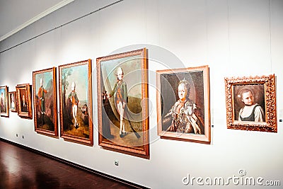 Exhibition of paintings in the art gallery. Modern art and traditional painting Editorial Stock Photo