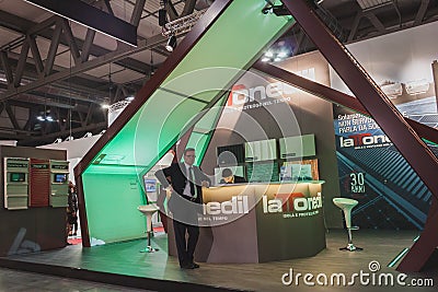 Exhibitors in their stand at Solarexpo 2014 in Milan, Italy Editorial Stock Photo