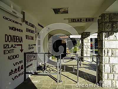 Exit from Cetinje bus station with greetings and goodbyes in many languages. Editorial Stock Photo