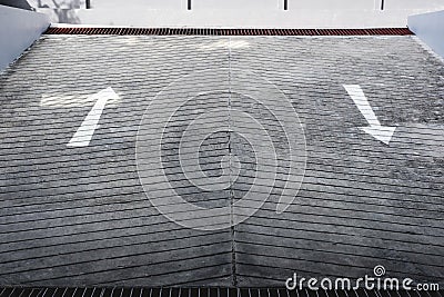 Exit entrance of underground car parking with arrows road sign Stock Photo