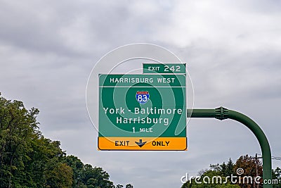 Exit 242 sign on I-76 Pennsylvania Turnpike for Interstate 83 Stock Photo