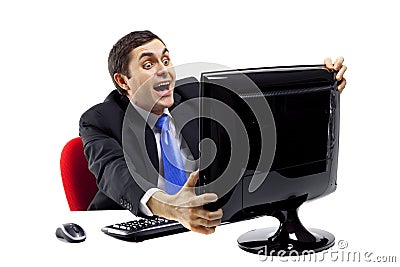 Exited businessman in front of a computer monitor Stock Photo