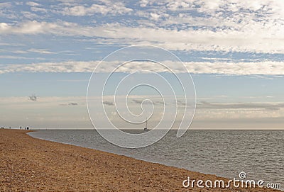 Exmouth, devon: low tide, beach and walkers. Cloudscape horizon Editorial Stock Photo