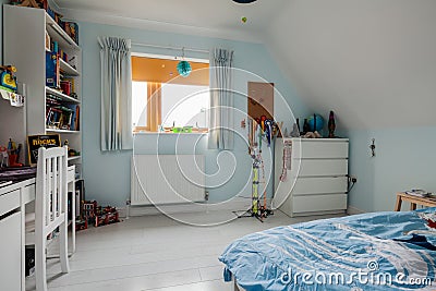 Childs blue and white furnished bedroom Editorial Stock Photo